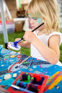Little girl is painting